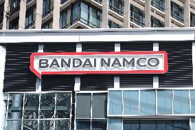 Bandai Namco Holdings signboard and logo.